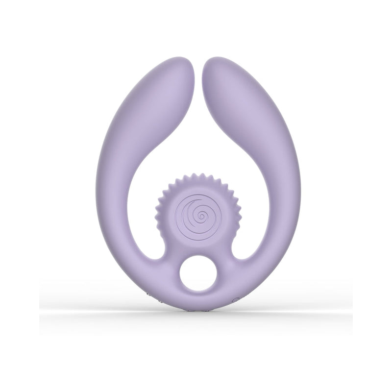 Purple silicone ring with a spiral design on a white background